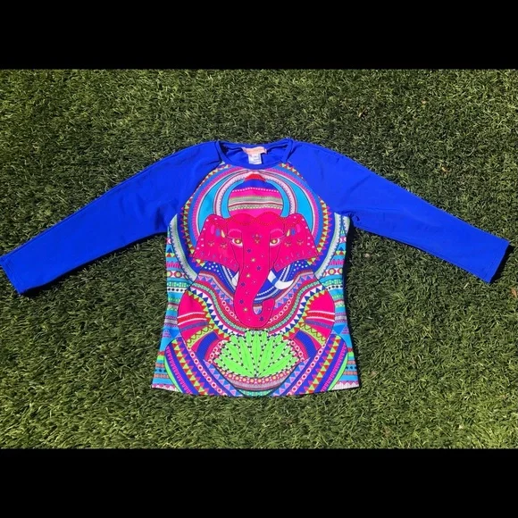 Mara Hoffman rash guard with pink ganesh against a pool blue background